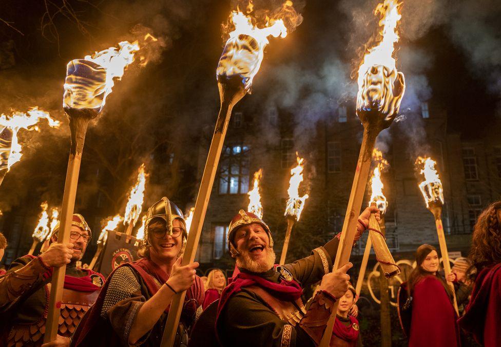 Vikings lead torchlight walk through Edinburgh - BBC News